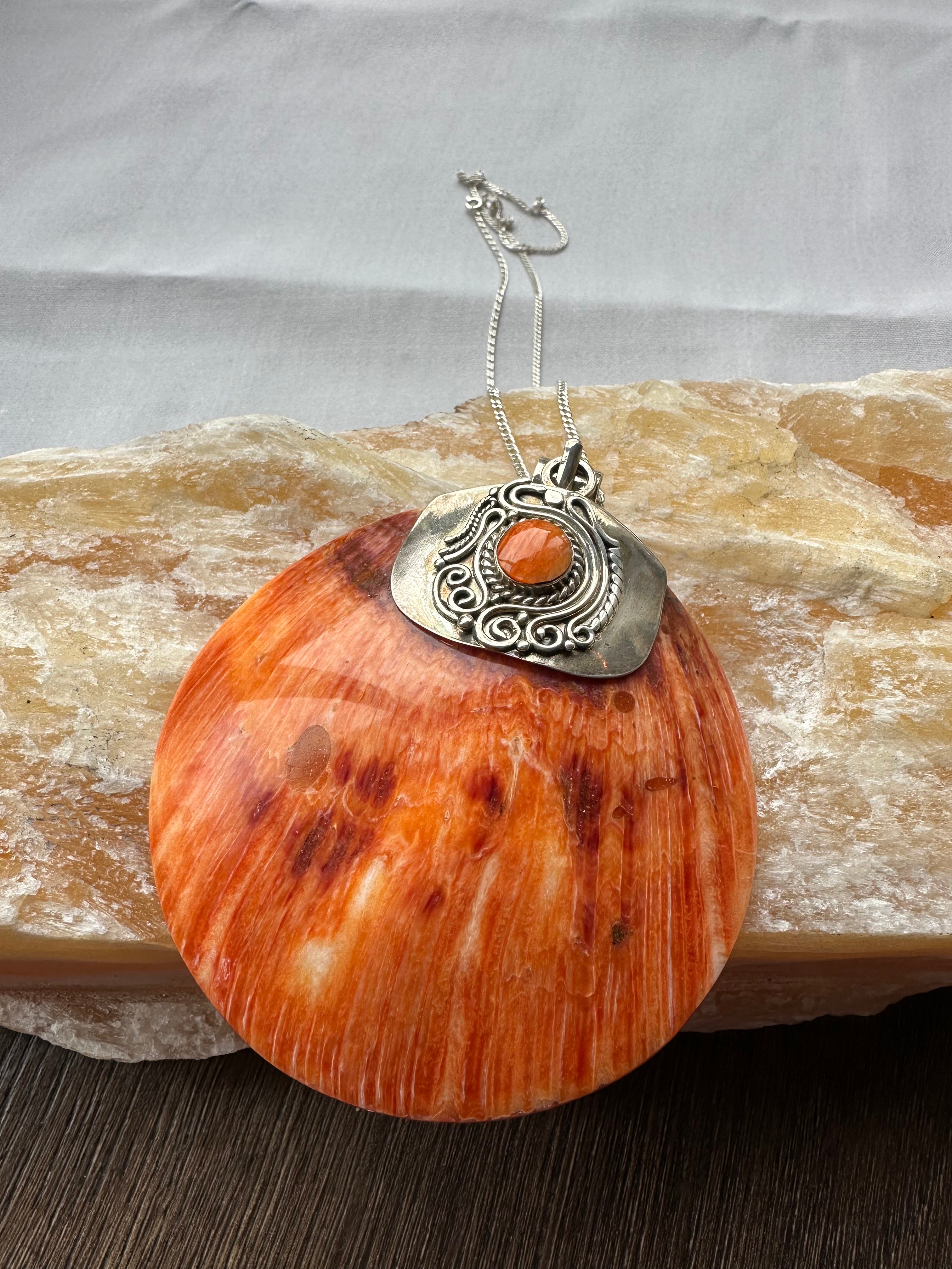 Real deals shell pendant